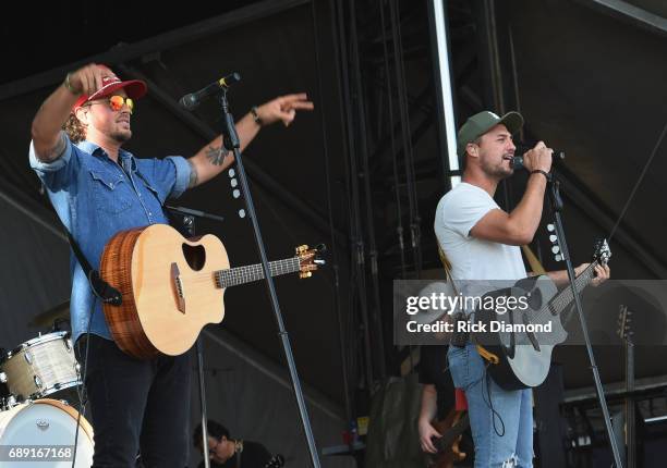 Love and Theft's Stephen Barker Liles and Eric Gunderson perform at Tree Town Music Festival - Day 3 on May 27, 2017 in Heritage Park, Forest City,...