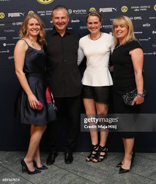 Wolfgang de Beer arrives with his family for the Borussia Dortmund champions party at the Grand Hyatt Hotel following their DFB Cup Final victory...