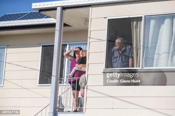 Neighbours watch a TV helicopter over head near the house of Schapelle Corby's mother in Loganlea on May 28, 2017 in Brisbane, Australia. Schapelle...