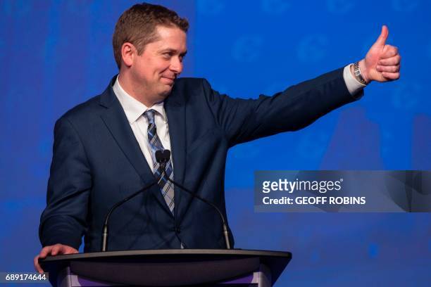 Andrew Scheer, newly elected leader of the Conservative Party of Canada, addresses the party's convention in Toronto, Ontario, May 27, 2017. / AFP...