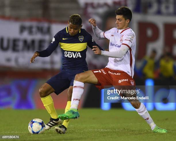 Wilmar Barrios of Boca Juniors fights for ball with Ignacio Pussetto of Huracan during a match between Huracan and Boca Juniors as part of Torneo...