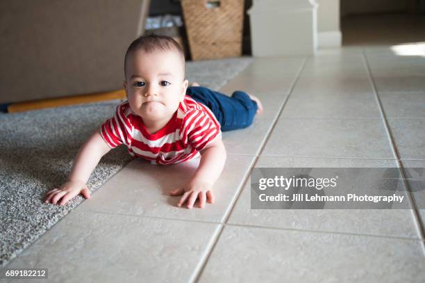 12 month old baby makes funny face - comedian stock pictures, royalty-free photos & images
