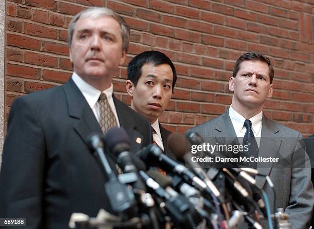 Attorney Michael Sullivan, Assistant US Attorney Colin Owyang, and FBI Special Agent in Charge Charles Prouty hold a press conference December 28,...