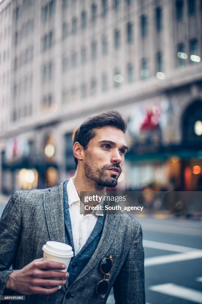 Handsome young man on a coffee brake