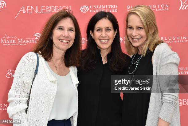 Susan Burris, Stacey Locker and Meryl Jacobs attend AVENUE on the Beach Kicks off Summer 2017 at Calissa on May 27, 2017 in Water Mill, New York.