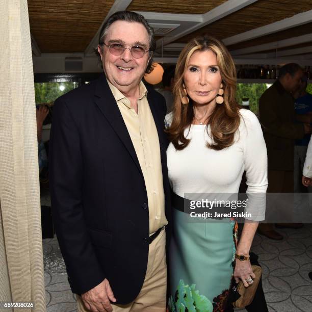 Bill Sclight and Cheri Kaufman attend AVENUE on the Beach Kicks off Summer 2017 at Calissa on May 27, 2017 in Water Mill, New York.