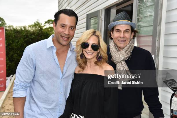 Joe Alexander, Randi Schatz and R. Couri Hay attend AVENUE on the Beach Kicks off Summer 2017 at Calissa on May 27, 2017 in Water Mill, New York.