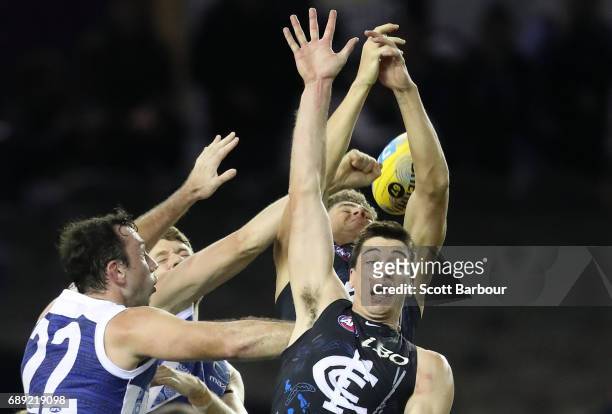 Matthew Kreuzer of the Blues and Todd Goldstein of the Kangaroos compete for the ball during the round 10 AFL match between the Carlton Blues and the...