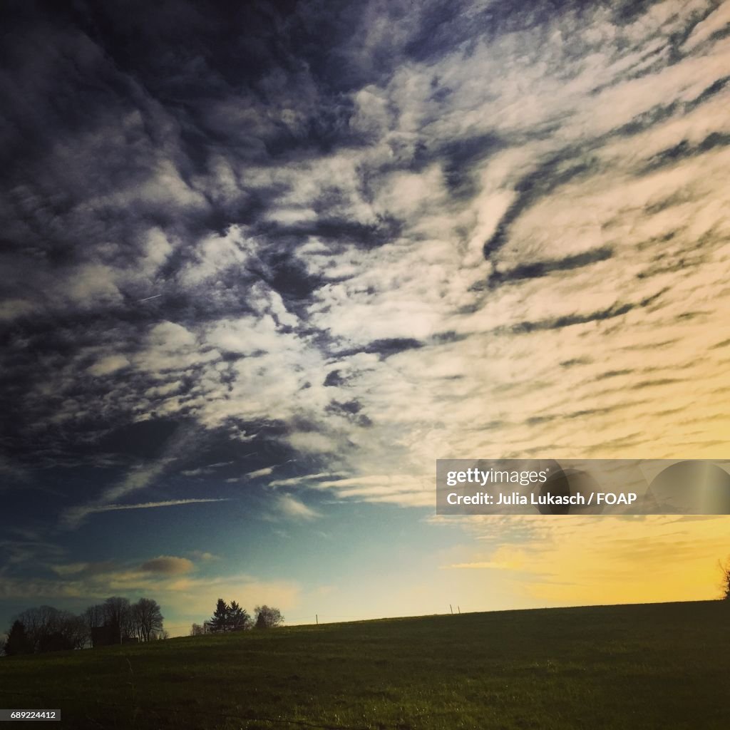 Cloudscape over field