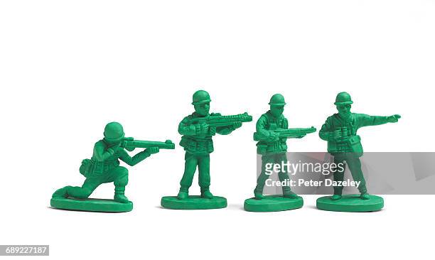 plastic toy soldiers in a line - 士兵 陸軍 個照片及圖片檔