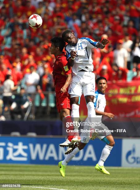 Duc Chinh Ha of Vietnam and Wesly Decas of Honduras compete for the ball during the FIFA U-20 World Cup Korea Republic 2017 group E match between...