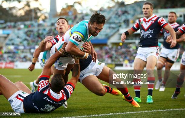 Jordan Rapana of the Raiders heads for the try line to score during the round 12 NRL match between the Canberra Raiders and the Sydney Roostrers at...