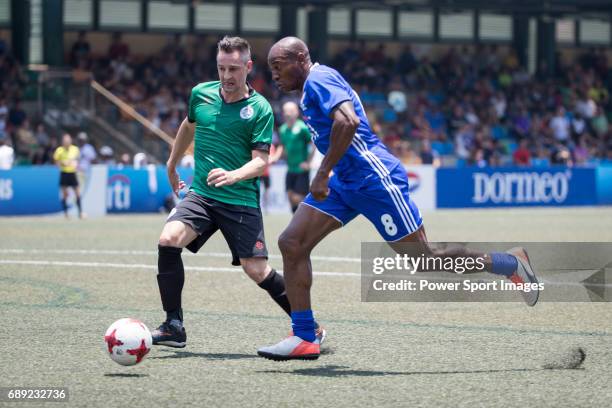 Citi All Stars' Luis Boa Morte competes with Yau Yee League Masters' Adam Bilbey for a ball during their Masters Tournament Cup Semi-Final match,...