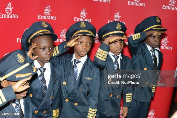 Selected school children in pilot uniform pose during the Emirates Airline organised Childrens Day in Lagos, Nigeria on Saturday May 27 2017.