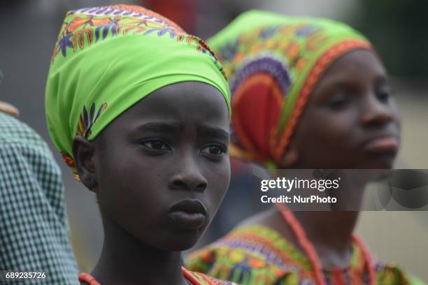 Pupil in native attire looks on during the Childrens Day parade at Agege Stadium in Lagos Nigeria May 27 2017.