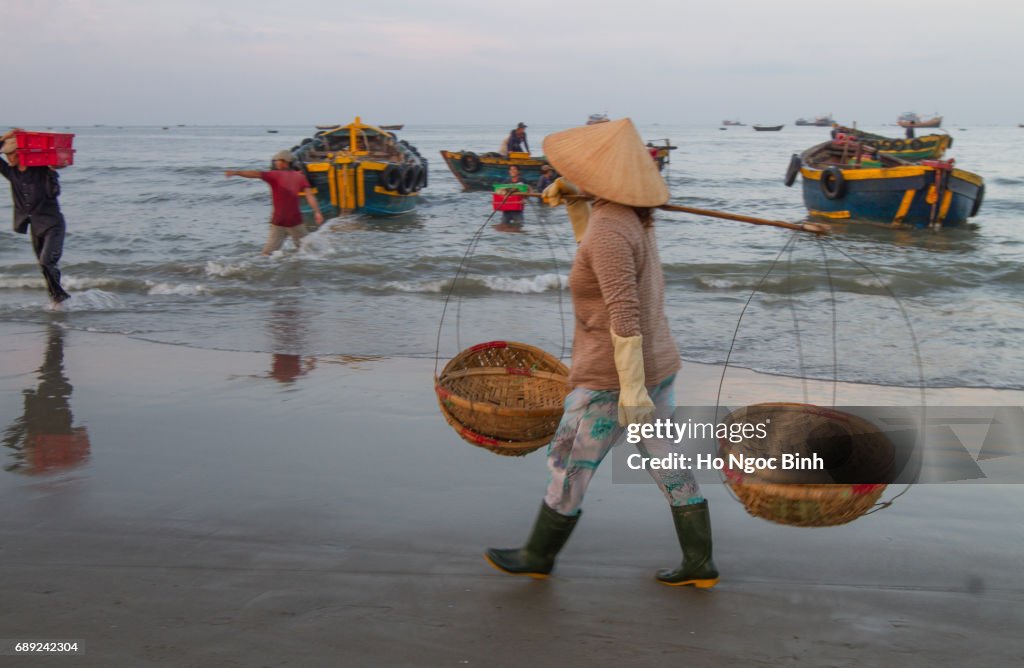 LONG HAI, VIETNAM - MAY 18, 2017: Vietnamese Non La at fishing village Long Hai, Vietnam