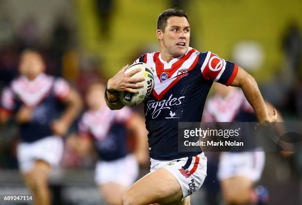 Michael Gordon of the Roosters makes a line break during the round 12 NRL match between the Canberra Raiders and the Sydney Roostrers at GIO Stadium...