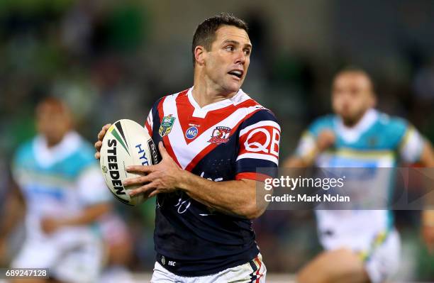 Michael Gordon of the Roosters makes a line break during the round 12 NRL match between the Canberra Raiders and the Sydney Roostrers at GIO Stadium...