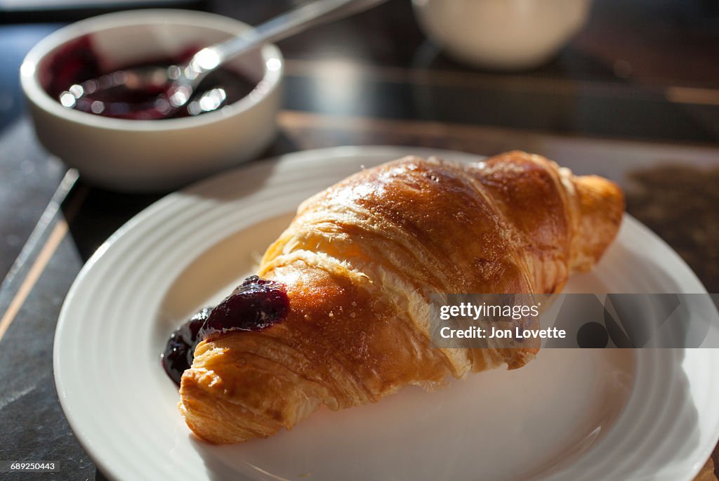 Croissant with dollop of jam