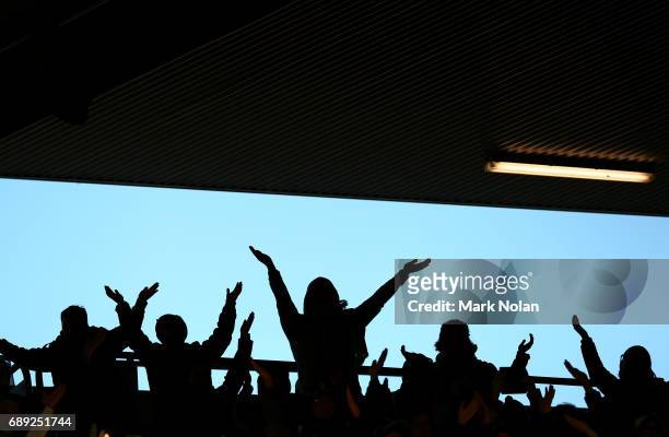 Raiders fans perform the Viking clap during the round 12 NRL match between the Canberra Raiders and the Sydney Roostrers at GIO Stadium on May 28,...