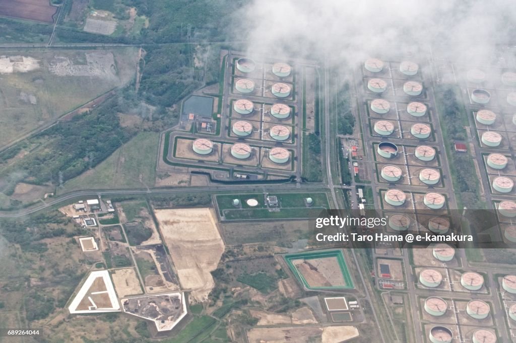 Oil stockpiling base in Tomakomai city in Hokkaido daytime aerial view from airplane