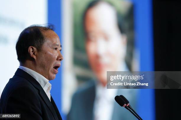 Kweichow Moutai Group Chairman Yuan Renguo speaks during the 2017 China International Big Data Industry Expo at Guiyang International Eco-Conference...