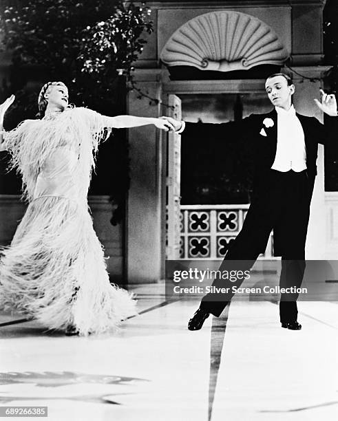Actors Fred Astaire as Jerry Travers and Ginger Rogers as Dale Tremont in the film 'Top Hat', 1935.