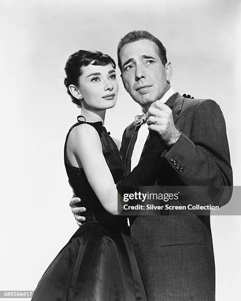 Actors Audrey Hepburn and Humphrey Bogart in a publicity still for the romantic comedy 'Sabrina', 1954.