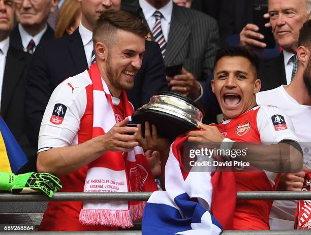 Aaron Ramsey and Alexis Sanchez of Arsenal celebrate after the match between Arsenal and Chelsea at Wembley Stadium on May 27, 2017 in London,...