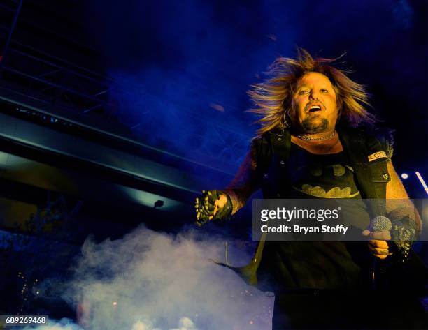 Singer Vince Neil performs during the "Rock the Street" Memorial Day weekend block party on Third Street at the Downtown Grand Hotel & Casino on May...
