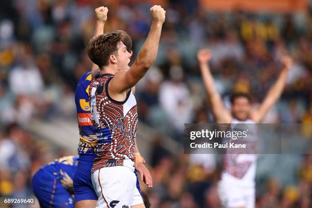 Toby Greene of the Giants celebrates winning the round 10 AFL match between the West Coast Eagles and the Greater Western Giants at Domain Stadium on...