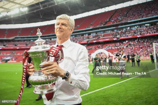 Arsene Wenger, Manager of Arsenal celebrates with The FA Cup after the Emirates FA Cup Final between Arsenal and Chelsea at Wembley Stadium on May...