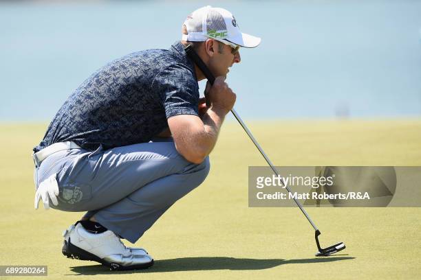 Brendan Jones of Australia waits to putt on the 18th green during the final round of Mizuno Open at JFE Setonaikai Golf Club on May 28, 2017 in...