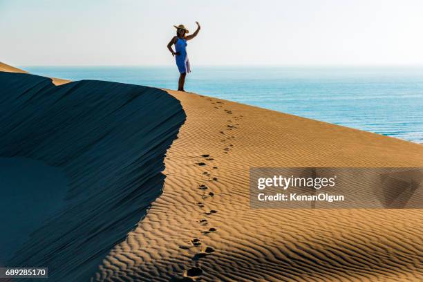 patara sand hills. - hot middle eastern women stock-fotos und bilder