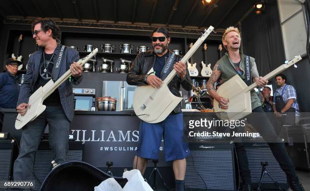 Bass players Stefan Lessard of Dave Matthews Band, Robert Trujillo of Metallica and Mike Dirnt of Green Day perform at the William Sonoma Culinary...