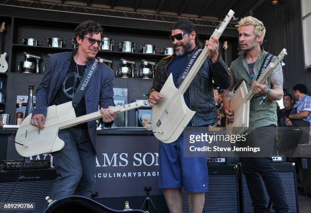 Bass players Stefan Lessard of Dave Matthews Band, Robert Trujillo of Metallica and Mike Dirnt of Green Day perform at the William Sonoma Culinary...