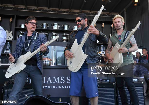 Bass players Stefan Lessard of Dave Matthews Band, Robert Trujillo of Metallica and Mike Dirnt of Green Day perform at the William Sonoma Culinary...