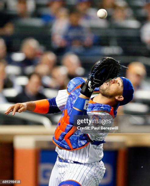 Catcher Rene Rivera of the New York Mets catches an infield popup hit by Hunter Renfroe in the sixth inning in an MLB baseball game against the San...