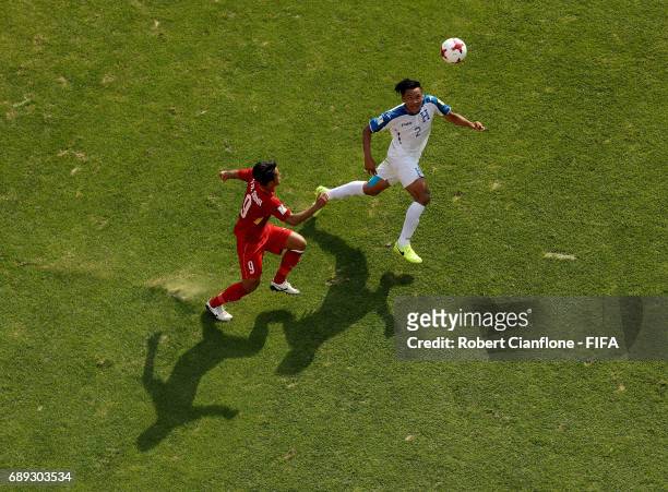 Denil Maldonado of Honduras is chased by Duc Chinh Ha of Vietnam during the FIFA U-20 World Cup Korea Republic 2017 group E match between Honduras...