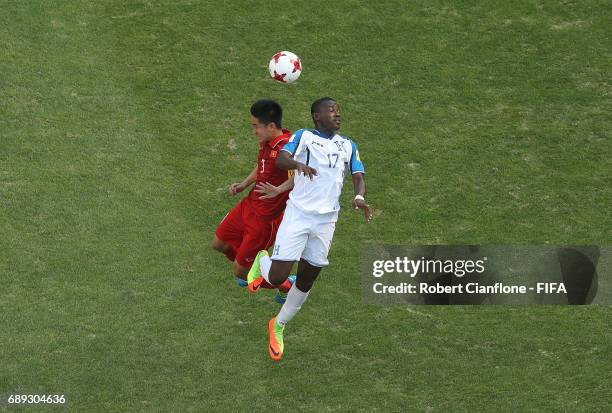 Byron Rodriguez of Honduras and Tan Sinh Huynh of Vietnam compete for the ball during the FIFA U-20 World Cup Korea Republic 2017 group E match...