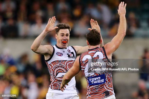 Heath Shaw and Jeremy Cameron of the Giants celebrate after defeating the Eagles during the round 10 AFL match between the West Coast Eagles and the...