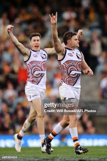 Heath Shaw and Jeremy Cameron of the Giants celebrate after defeating the Eagles during the round 10 AFL match between the West Coast Eagles and the...