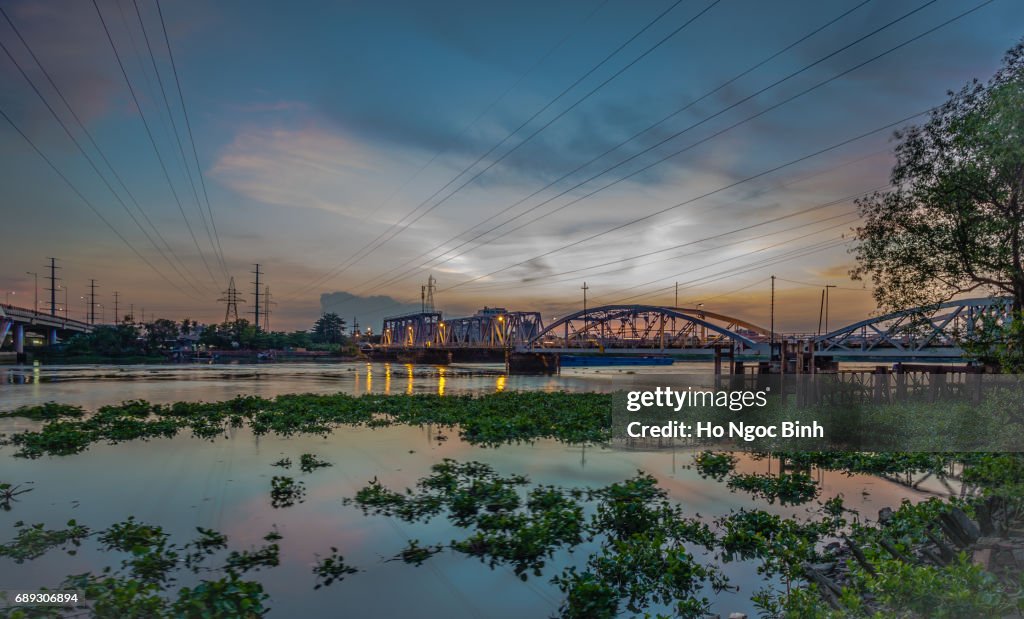 Dusk over Binh Loi Bridge new and old by night, Ho Chi Minh City, Vietnam