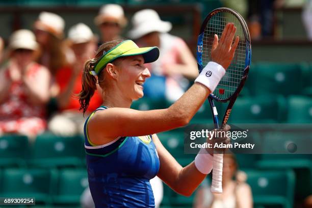 Ekaterina Makarova of Russia celebrates victory after the ladies singles first round match against Angelique Kerber of Germany on day one of the 2017...