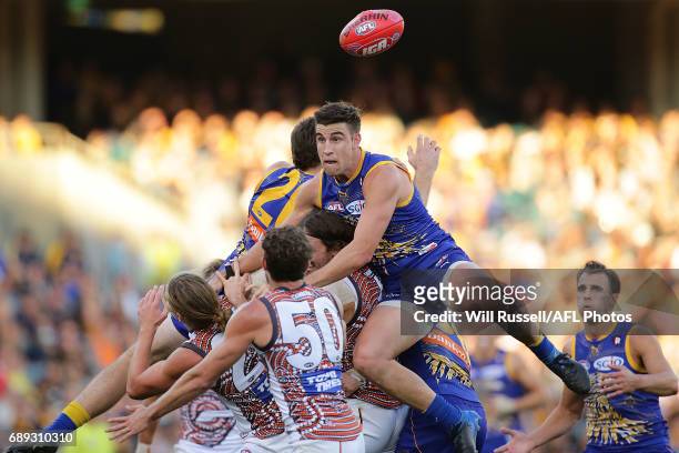 Jeremy McGovern and Elliot Yeo of the Eagles try to mark during the round 10 AFL match between the West Coast Eagles and the Greater Western Giants...