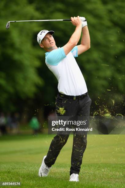 Alex Noren of Sweden hits his third shot on the 17th hole during day four of the BMW PGA Championship at Wentworth on May 28, 2017 in Virginia Water,...