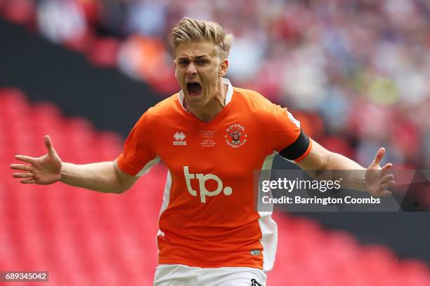 Brad Potts of Blackpool celebrates scoring his sides first goal during the Sky Bet League Two Playoff Final between Blackpool and Exeter City at...