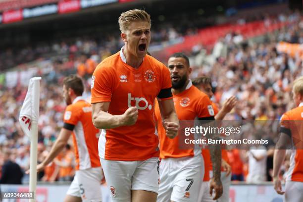 Brad Potts of Blackpool celebrates scoring his sides first goal during the Sky Bet League Two Playoff Final between Blackpool and Exeter City at...