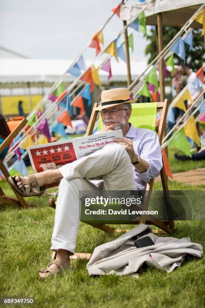 Festival goers enjoy the sunshine at the Hay Festival on May 28, 2017 in Hay on Wye, United Kingdom.