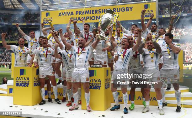 Gareth Steenson and Jack Yeandle of Exeter Chiefs raise the Premiership trophy after their victory during the Aviva Premiership match between Wasps...